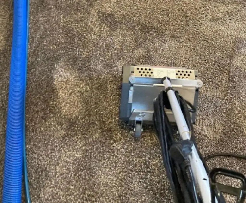 Vacuum deep cleaning a residential carpet