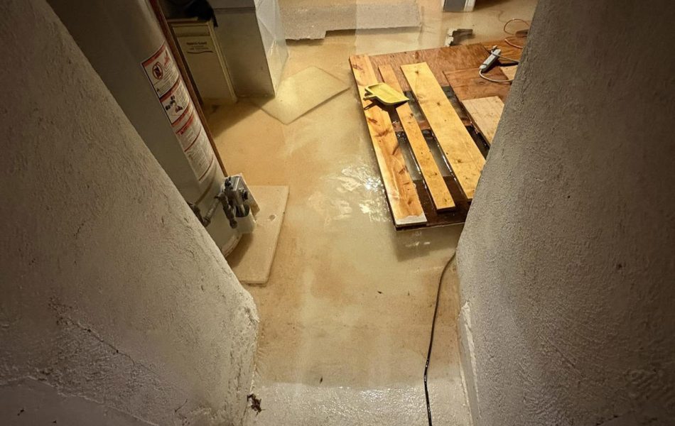 Extreme Water Damage and flooding in a basement after a storm