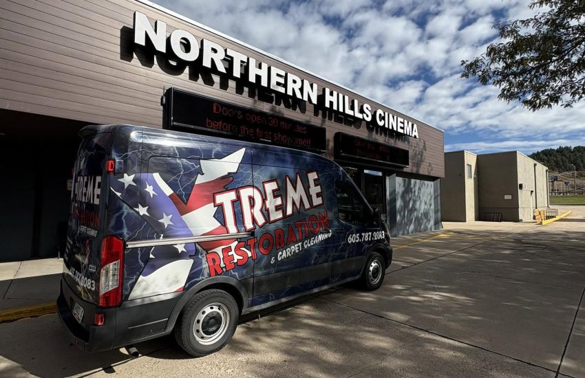Xtreme Restoration Van outside of Northern Hills Cinema in Spearfish SD